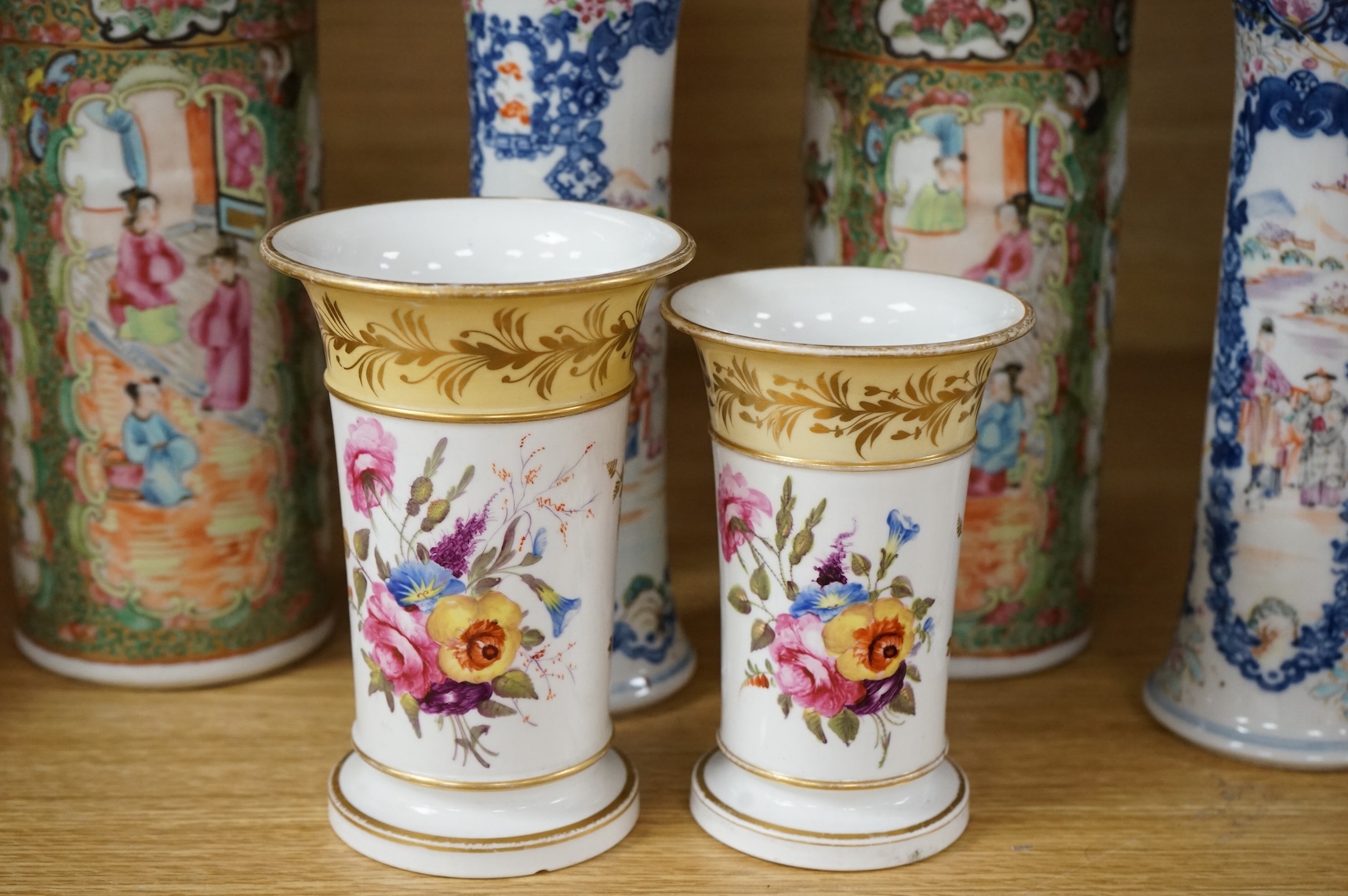 A pair of 18th century Chinese famille rose sleeve vases, a pair of 19th century Canton pattern vases and two English spill vases (6), tallest 25cm